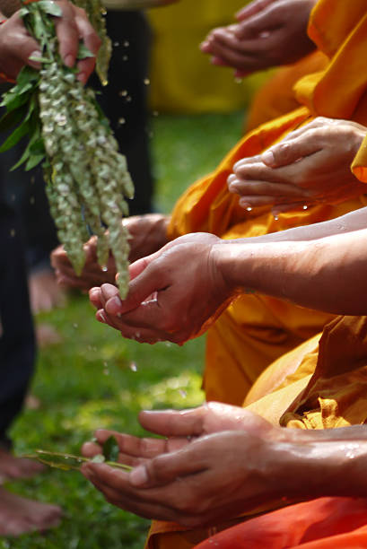 istock Bathing to Monk on Thai New year's day. 486621019