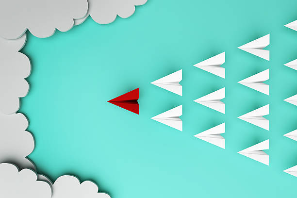 istock Red paper plane of leading leadership concept 486621490
