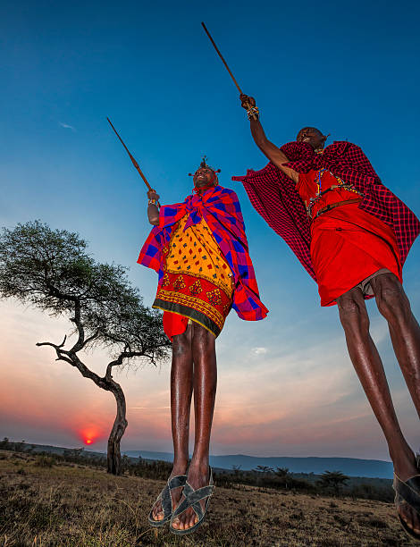 Same, Tanzania, 5th June, 2019: young  Maasai warrior in full traditional party outfit, jumping with pride