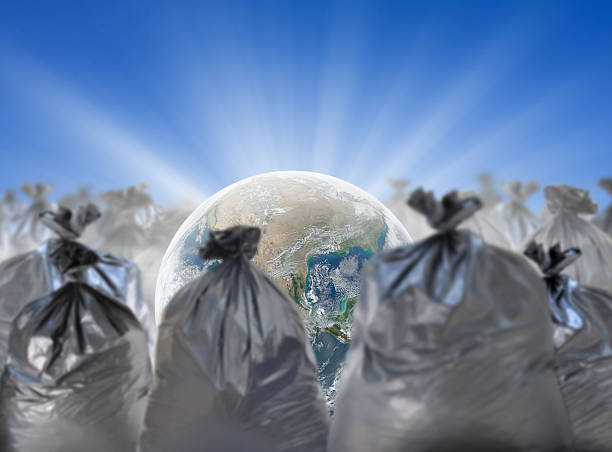 istock Earth among garbage bag , environment concept , Element furnished by NASA 486622036