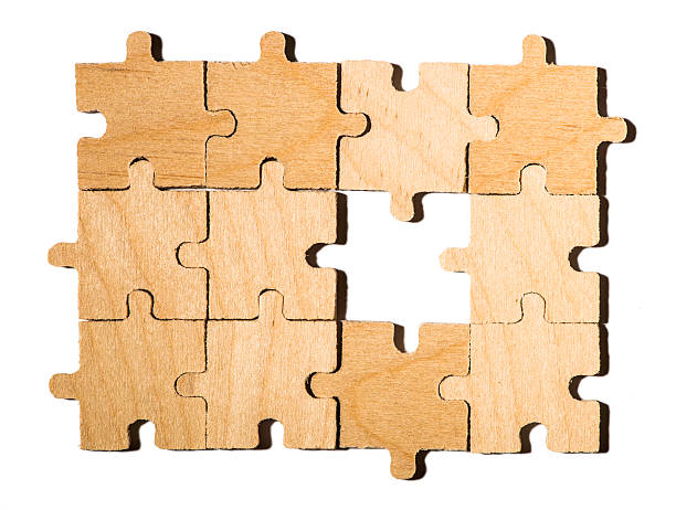 istock Wooden puzzle on white background. 486622953