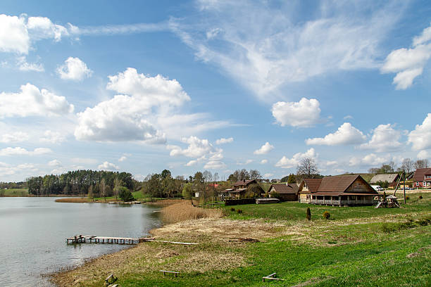 istock Small Wooden Houses on Lakeside 486625392