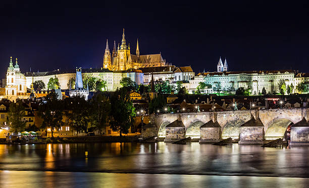 istock Reflection of Prague castle and the Charles bridge at dusk 486626806