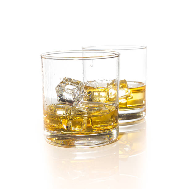 istock whiskey glasses with ice cubes isolated on white set collage 486627196