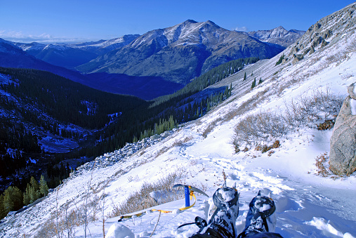 Snow capped mountain peaks in alpine scene