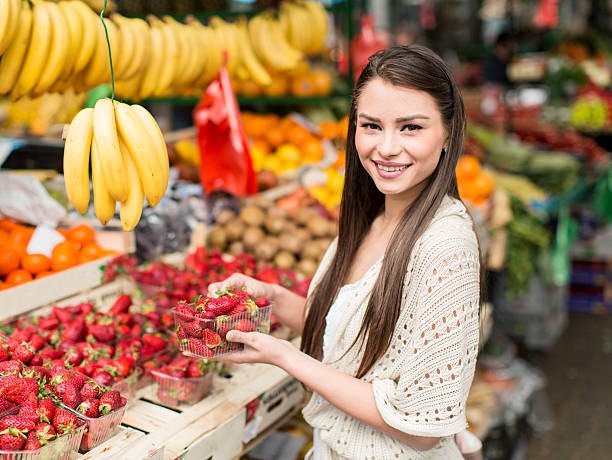 istock Young woman on the market 486627514