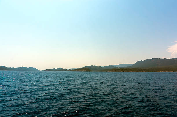 rocky coast, blue sea and sky in Turkey