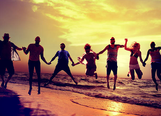 istock Diverse Beach Summer Friends Fun Jump Shot Concept 486629650