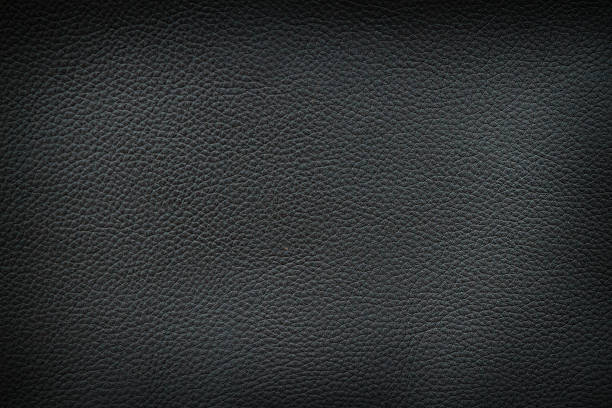 istock Texture of old crumpled black leather. 486630624