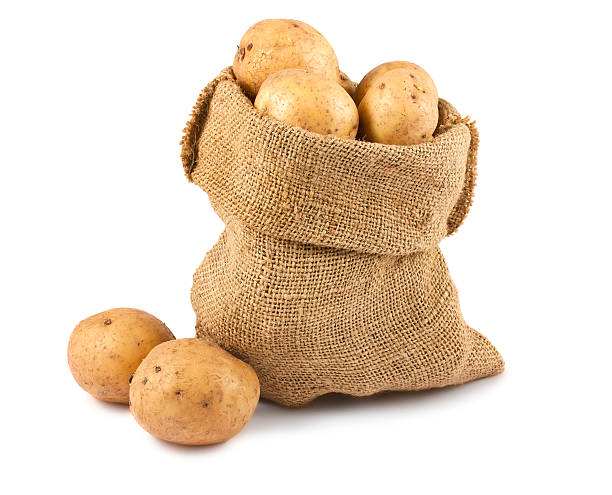 istock Raw potatoes in burlap sack 486631166