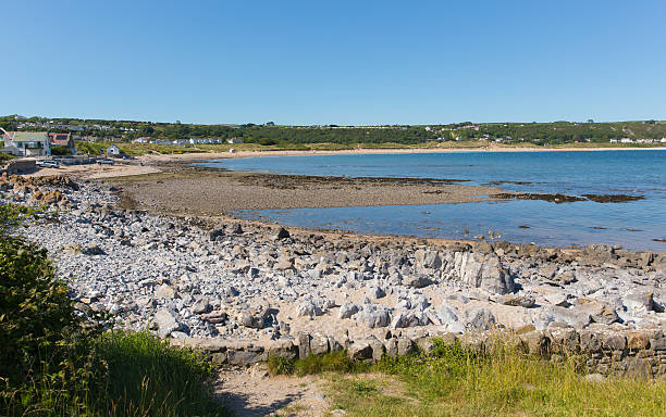 istock Port Eynon Bay The Gower Wales blue sky summer day 486632856
