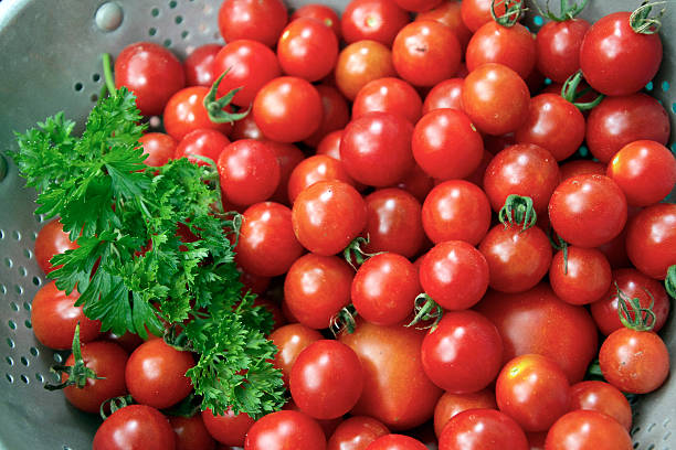 istock Ripe, Colorful Cherry Tomatoes and Parsley 486635692