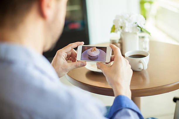 Taking photo of this delicious cupcake