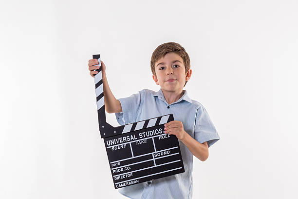 istock Child with movie clapper board 486639180