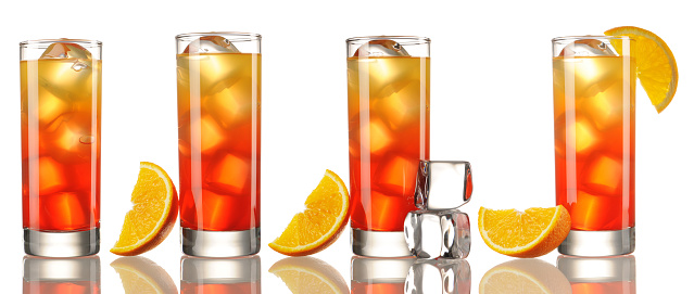 Orange juice glass on white background.