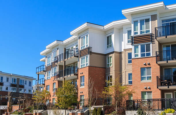 Apartment Building Architectural details of modern apartment building. apartment complex united states stock pictures, royalty-free photos & images