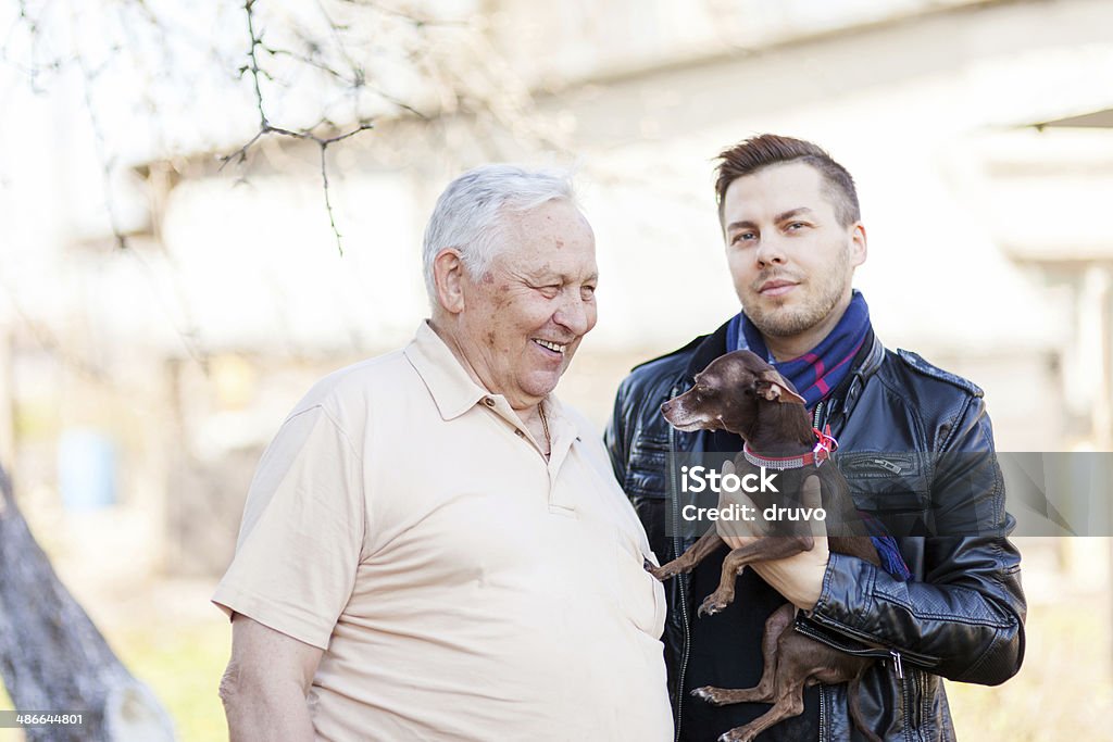 Pai, filho e pouco doggy - Royalty-free 30-34 Anos Foto de stock