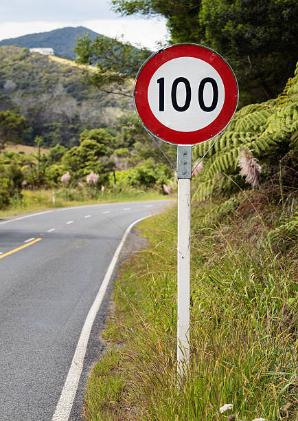 100 Speed Limit A sign in rural New Zealand for a 100Km per hour speed limit 100 mph stock pictures, royalty-free photos & images