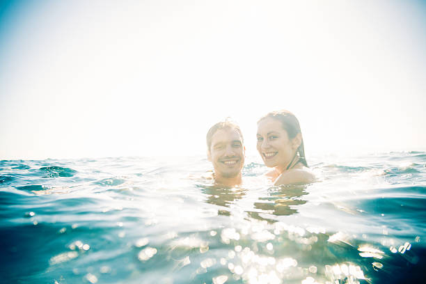 istock young couple swimming 486645579