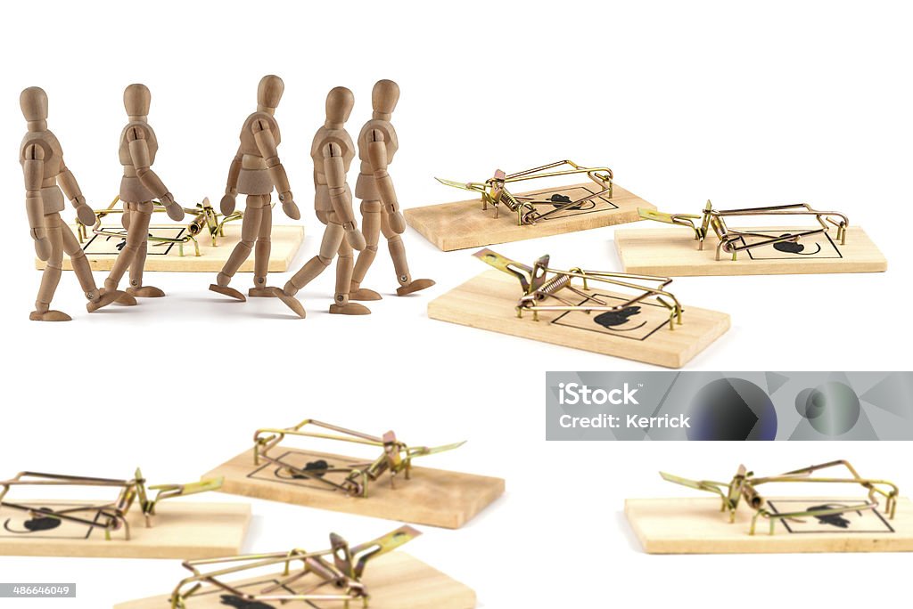 wooden mannequins walking trough mousetraps wooden mannequins walking trough mousetraps - careful Adult Stock Photo