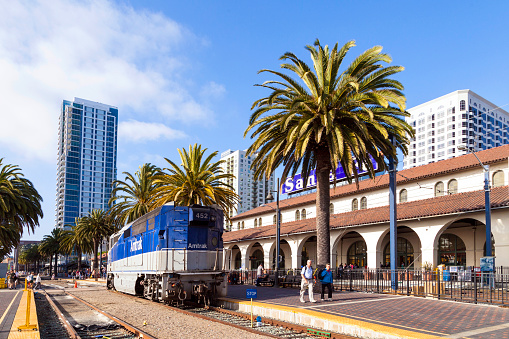 San Diego, USA - June 11, 2012:  train arrives at Union Station  in San Diego, USA. The Spanish Colonial Revival style station opened on March 8, 1915 as Santa Fe Depot.