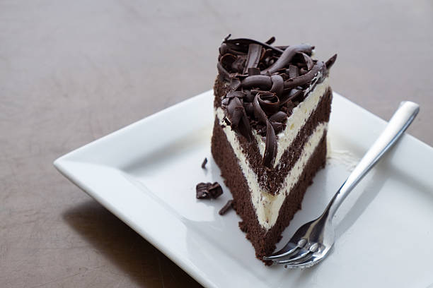 istock black forest cake in white plate on the dark table 486647000