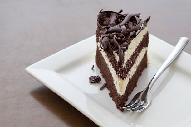 istock black forest cake in white plate on the dark table 486647704