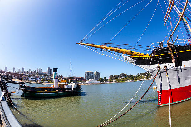 San Francisco, CA, USA - October 7, 2019: The SS Jeremiah O'Brien, a Liberty ship that participated in D-Day on 6 June 1944, seen through the Pier 43 Ferry Arch at Fisherman's Wharf.