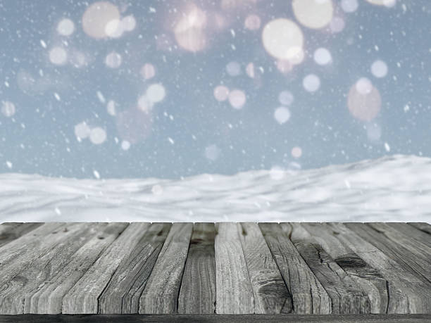 istock Wooden table with defocussed snowy landscape 486648080