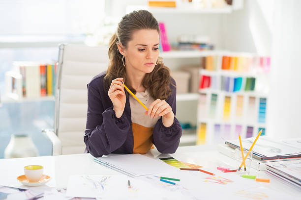 istock fashion designer in office 486649083