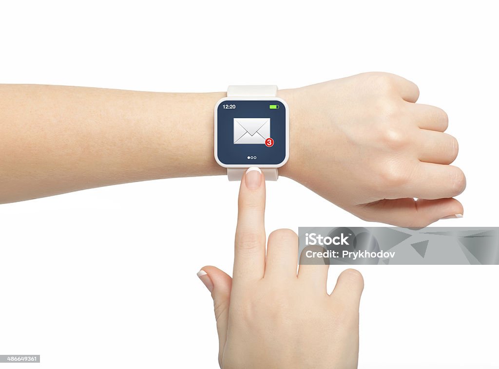 female hand hold smartwatch with email on the screen Isolated female hand with white smartwatch with email on the screen Adult Stock Photo