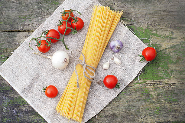 Pasta spaghetti with fresh vegetables stock photo