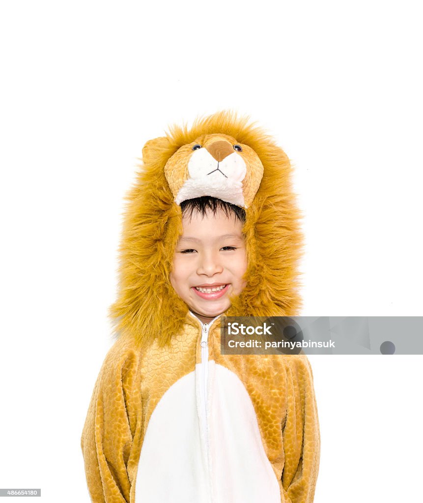 boy in lion costume Asian boy in lion costume isolated on white Child Stock Photo