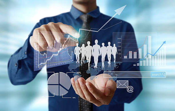 istock Businessman with financial symbols 486655342