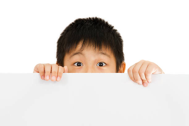 istock Asian Chinese Children Holding blank white board. 486656740