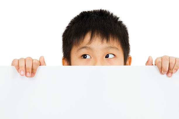 istock Asian Chinese Children Holding blank white board. 486657072