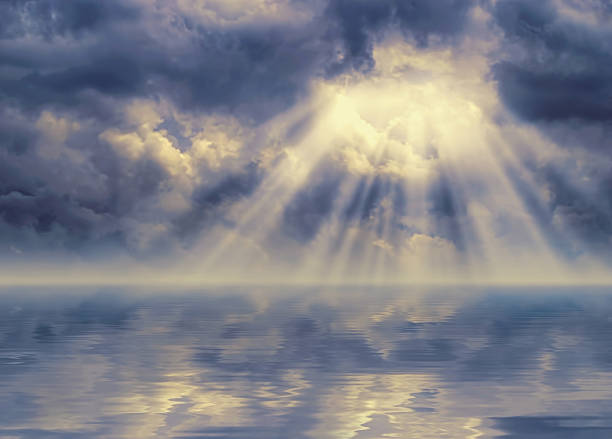 istock Ray of sunlight breaks through stormy sky 486657992
