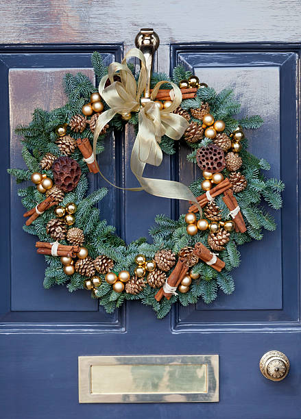 istock Christmas Wreath with Gold Pinecones & Cinnamon 486662758