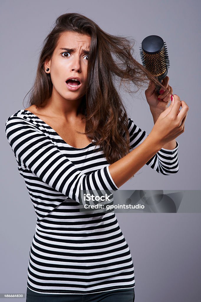 Every girl knows this problem very well Comb - Hair Care Stock Photo