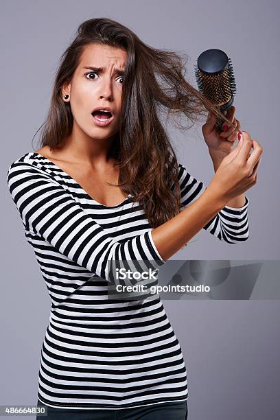 Every Girl Knows This Problem Very Well Stock Photo - Download Image Now - Comb - Hair Care, 2015, Adult