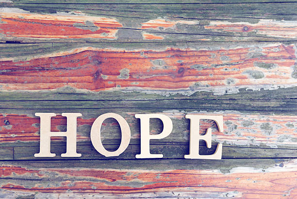 istock Wooden words HOPE on mottled pallet 486666935