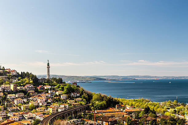 Old lighthouse in the bay of Trieste Spring sunny day in the bay of Trieste trieste stock pictures, royalty-free photos & images