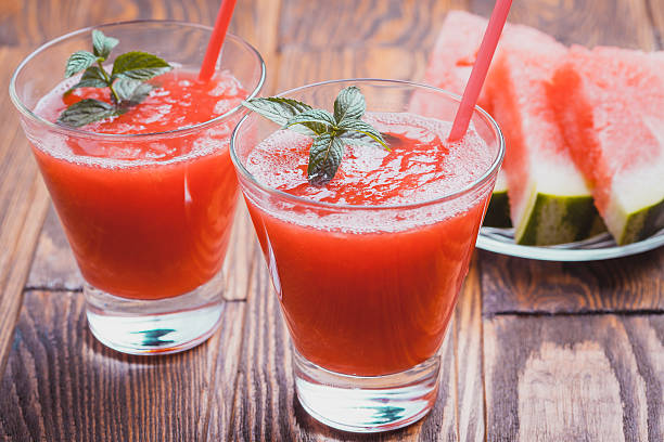 istock Watermelon smoothie on a wooden table. 486667938