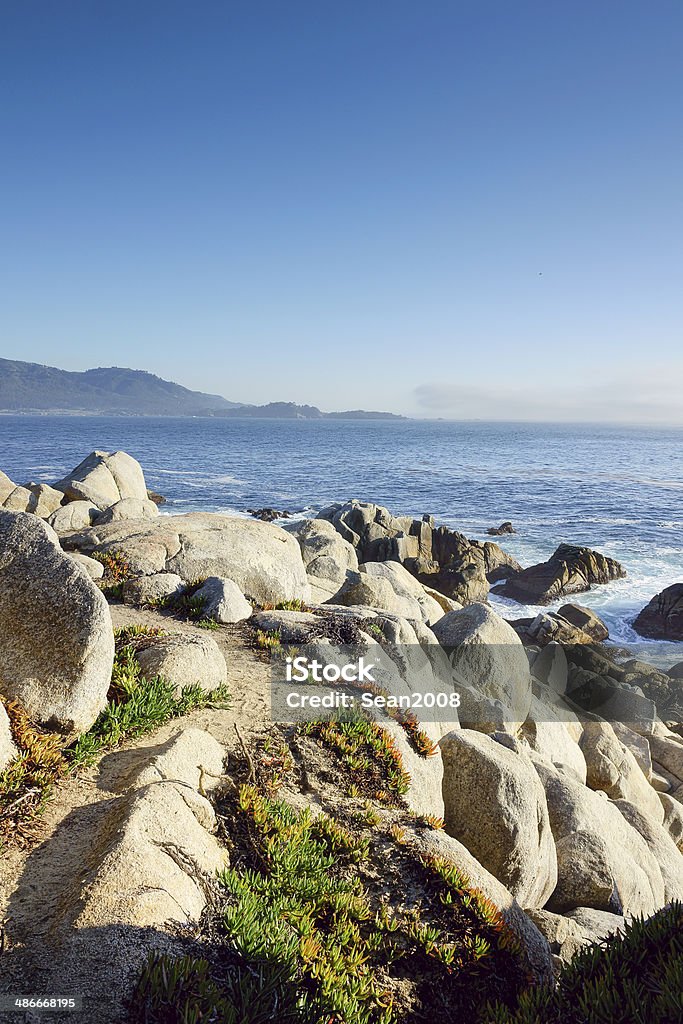 Rock at seaside Beach Stock Photo