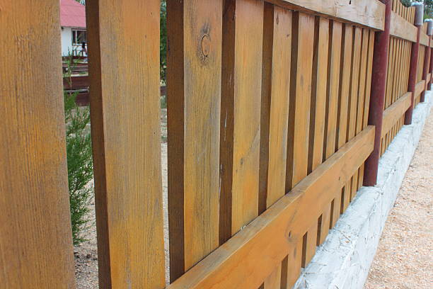 istock fence made of wood 486670178