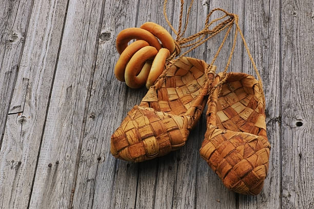istock Braided sandals on wood 486670288