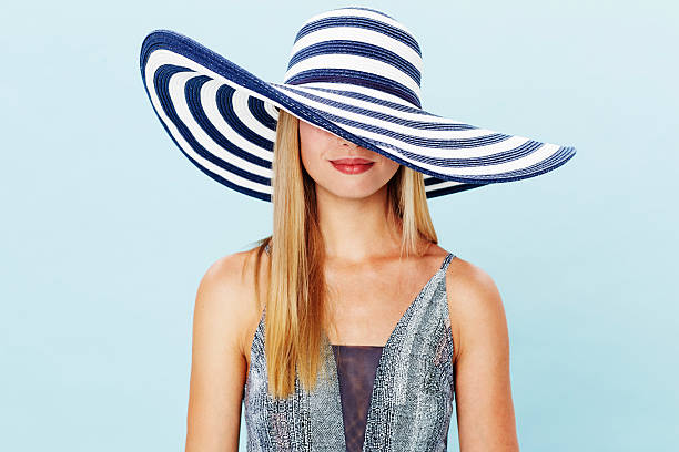 istock Young woman in large hat 486670624