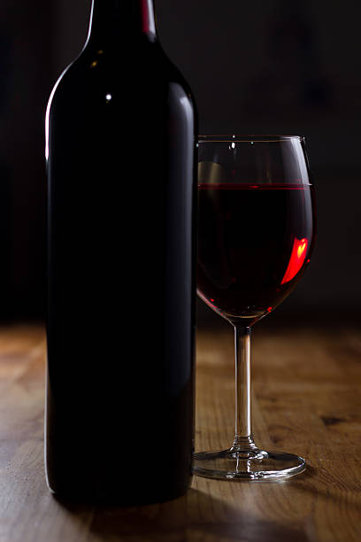 istock Glass of Red Wine and Bottle 486670868