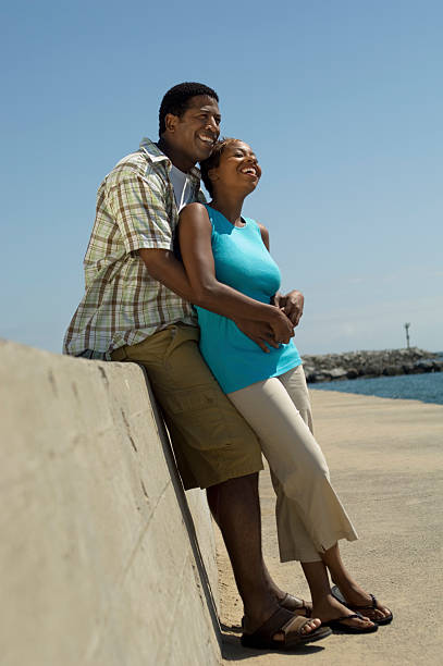 istock Couple Relaxing at the Beach 486673569