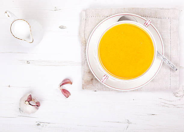 istock Top view of carrot soup in bowl 486674239